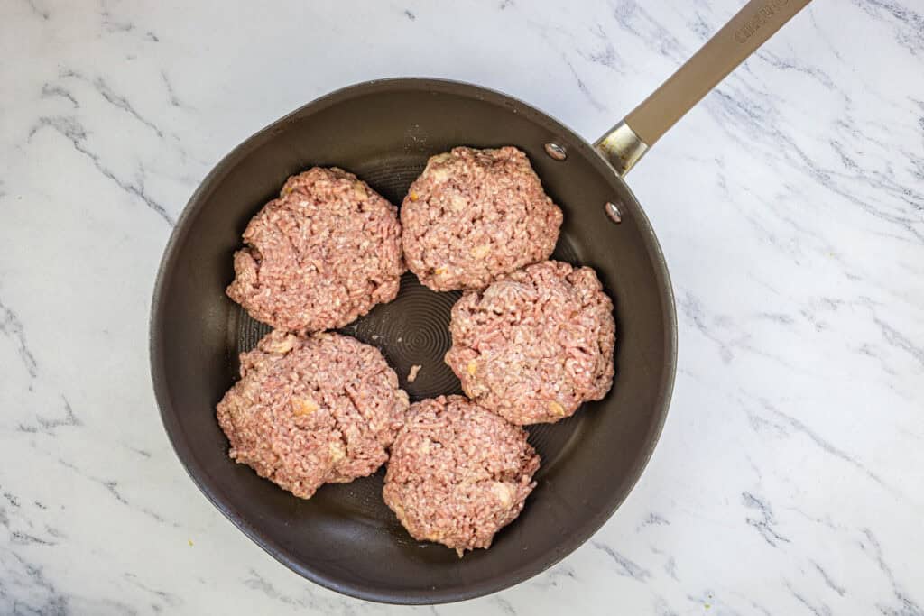 Brown the patties in a skillet over medium heat on both sides.