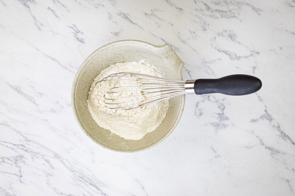 Mix the flour, baking powder, and baking soda together in a bowl.