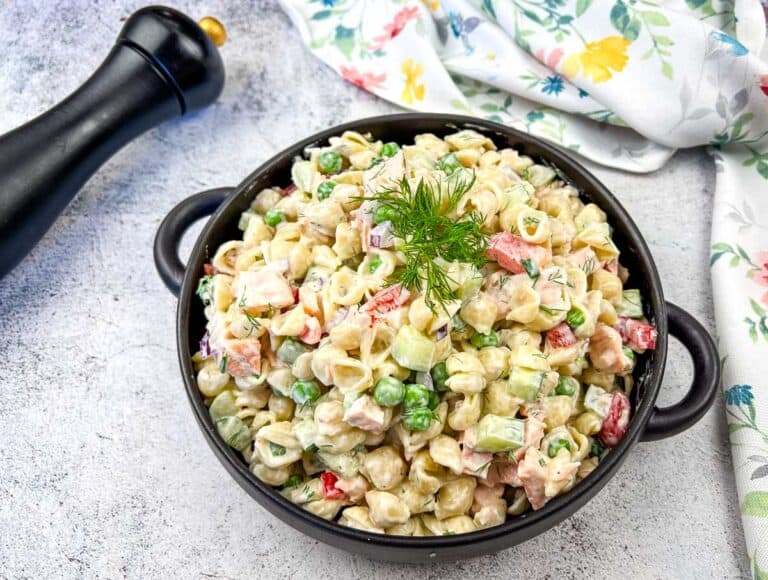 Close up photo of salmon pasta salad.