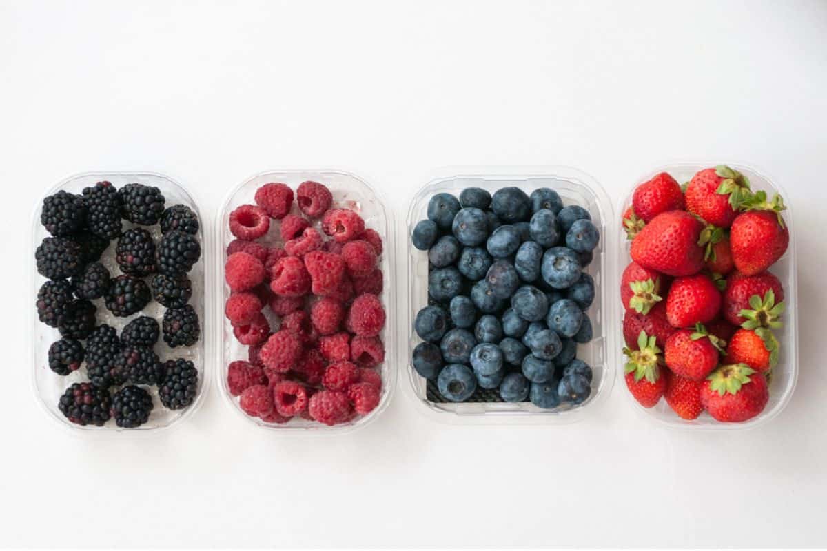 Summer berries in their containers.