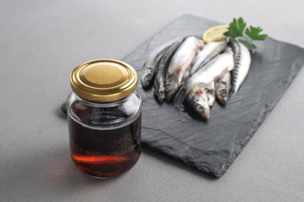 Fermented fish sauce prepared by fermentation fish-salted garum sauce in a bottle.