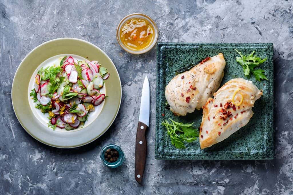 Grilled chicken with radish and sides.