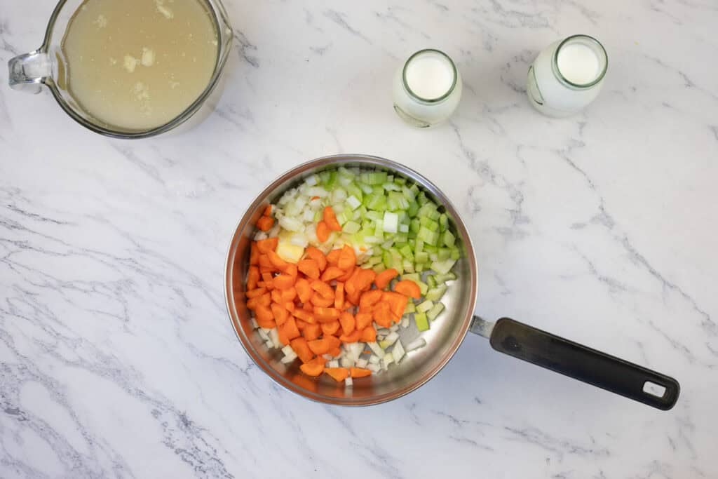 Sauté until the vegetables are softened and fragrant.