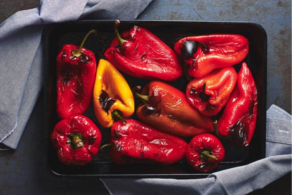 Roasted peppers in a pan.