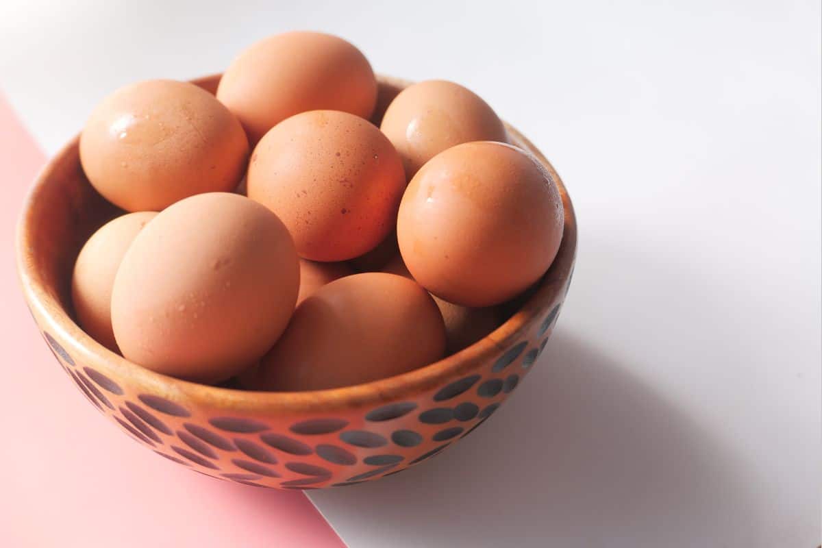 Fresh eggs in a bowl.