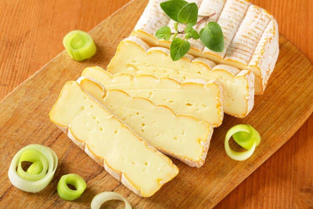 Cheese on a wooden board.