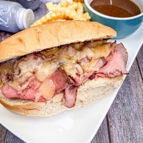 Copycat Cole's French Dip Sandwich on a white plate.