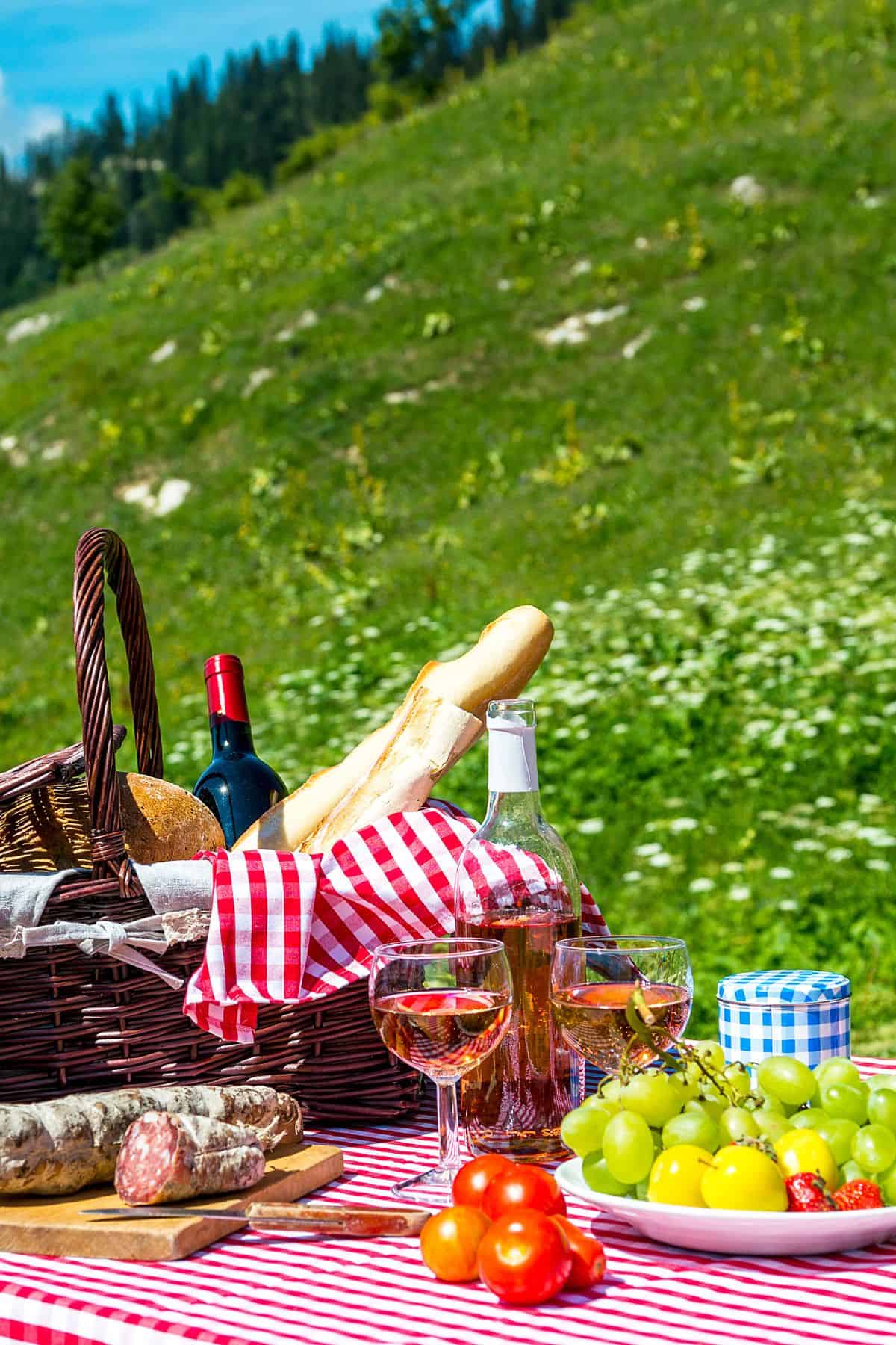 A picnic basket on the grass.