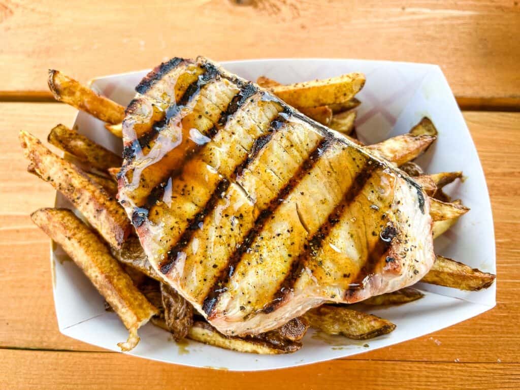 Grilled tuna and fries.