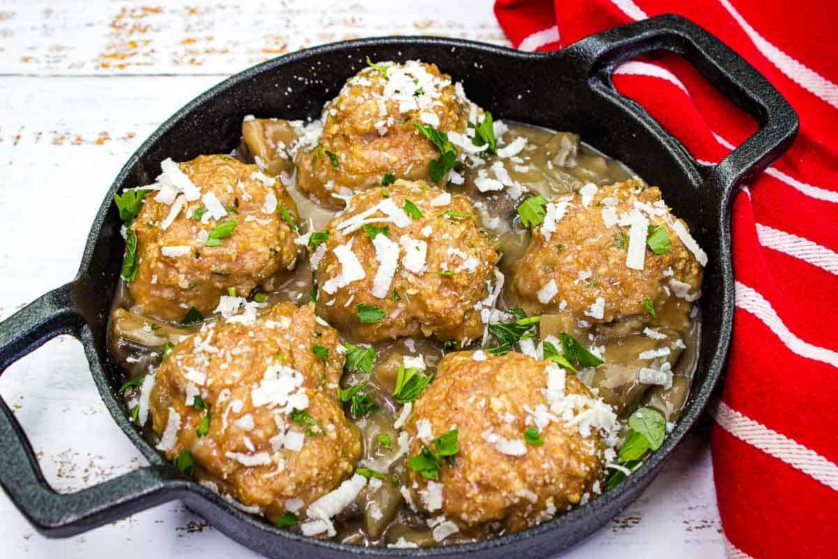 Chicken Marsala Meatballs in a black dish.