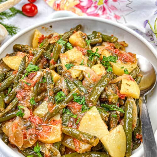 Greek Green Beans on a white bowl.