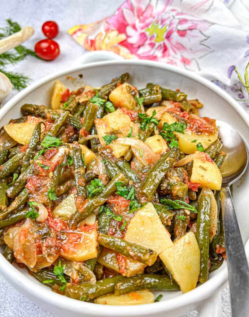 Greek Green Beans on a white bowl.