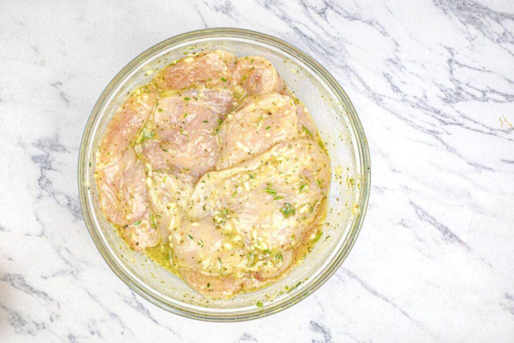 Marinated chicken on a bowl.