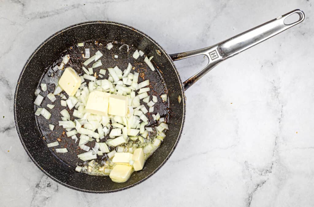 Sauté onions in butter over medium heat until softened.