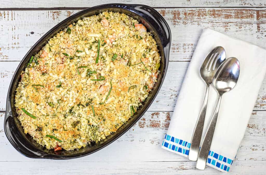 Top-down shot of Greek Shrimp & Rice on a casserole dish.