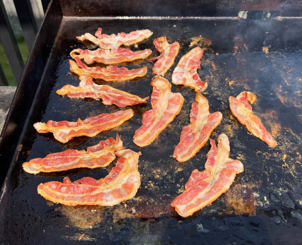 Cook the bacon until crisp.