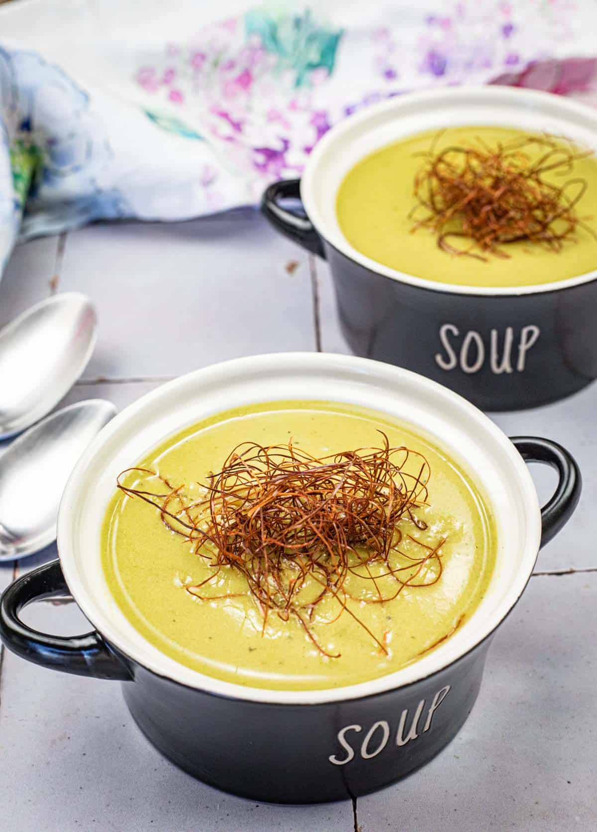 Two bowls of Cream of Poblano Soup.