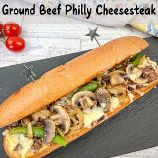 Ground Beef Philly Cheesesteak on a slate plate.