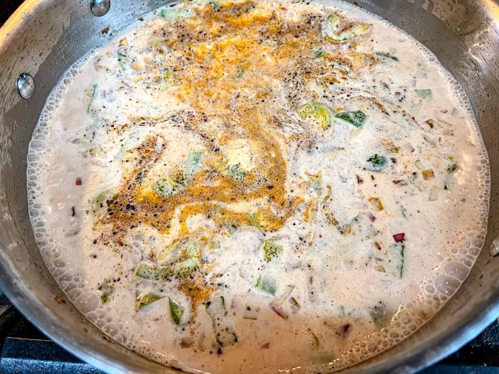 Reduce the heat to low, and add the heavy cream to the skillet.