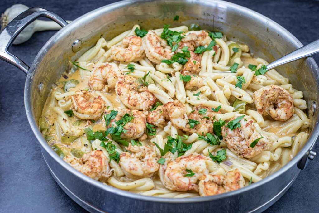 Cajun Pasta with Shrimp on a skillet.