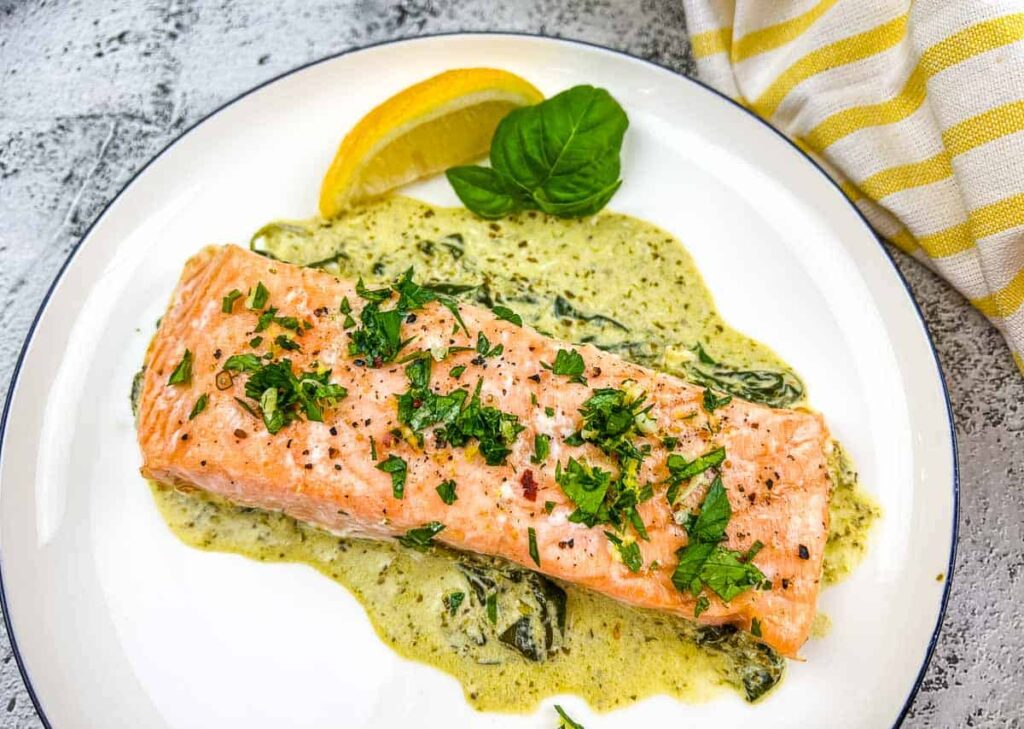Baked Pesto Salmon on a plate.
