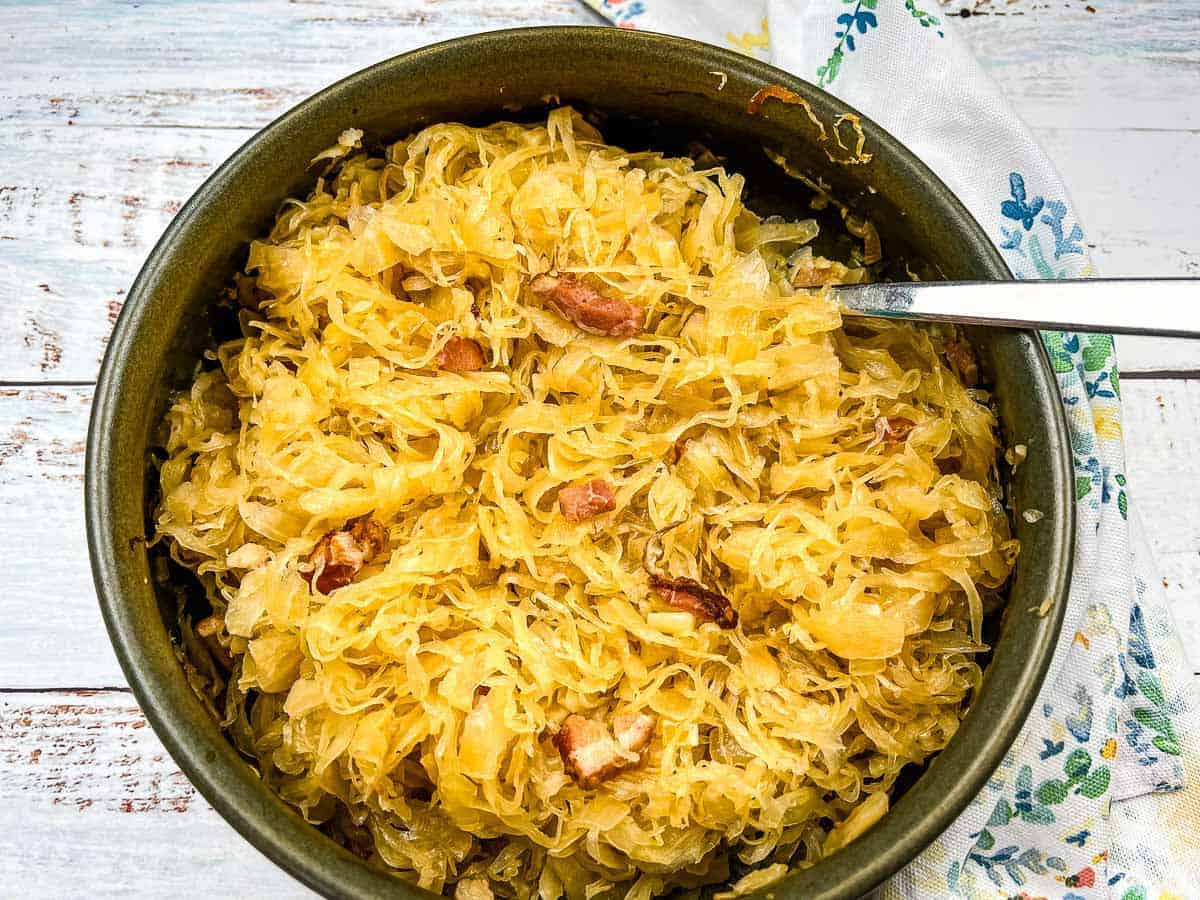 Sauerkraut with Apples & Bacon on a bowl.