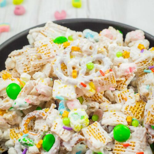 A bowl of Leprechaun Bait on a wooden table.