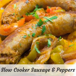 Close-up of slow-cooked sausages with sliced peppers and onions in a sauce, garnished with herbs. Text reads: "Slow Cooker Sausage & Peppers.