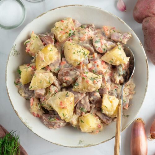 Photo of delicious Creamy Red Potato Salad with Pickle.
