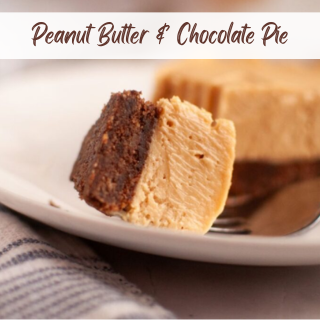 A slice of peanut butter and chocolate pie sits on a plate with a fork, showing creamy and dense layers.