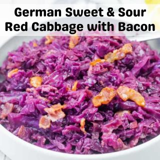 A close-up of German sweet and sour red cabbage with bacon, served in a white bowl. The dish features vibrant purple cabbage and pieces of bacon.